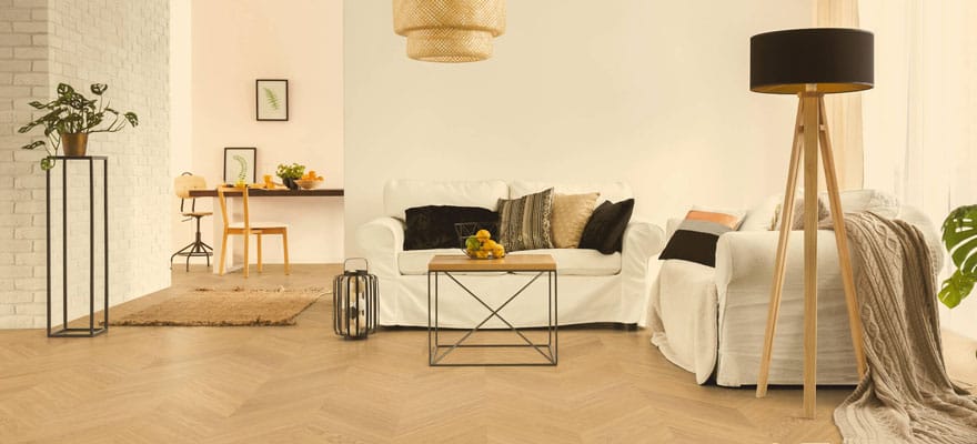 Gemütliches Wohnzimmer mit französischem Fischgrät Parkett Boden