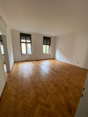 Wohnzimmer mit Fischgrät Parkett